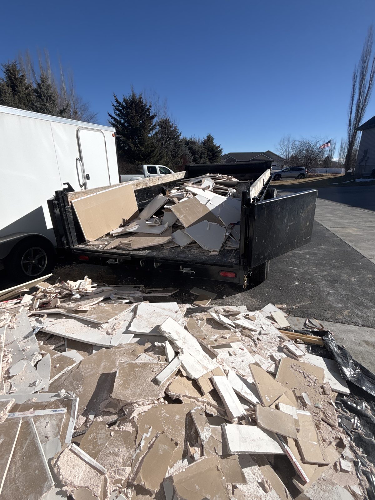 Loaded dump trailer of demolition debris