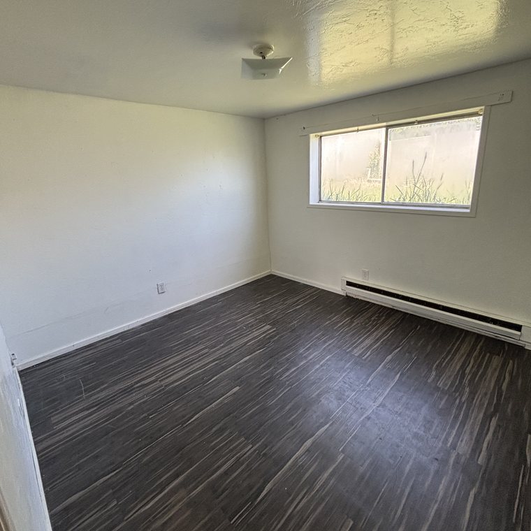 Bedroom cleanout after — empty